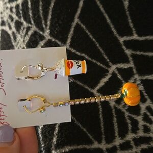 Betsey Johnson mismatched pumpkin spice earrings